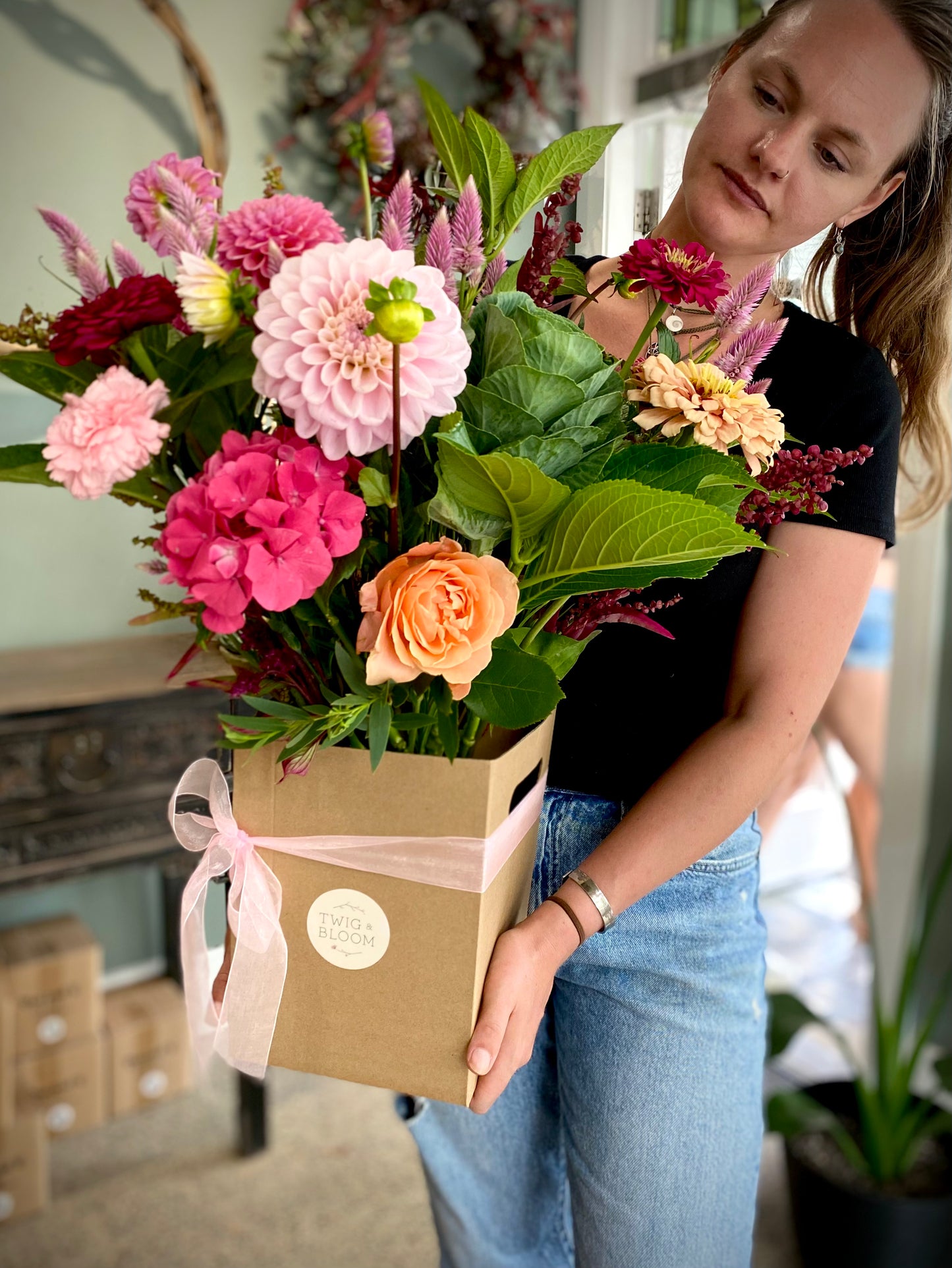Rosada Fresh Flower Arrangement in pink vase for valentine's. Packaged up ready for delivery.