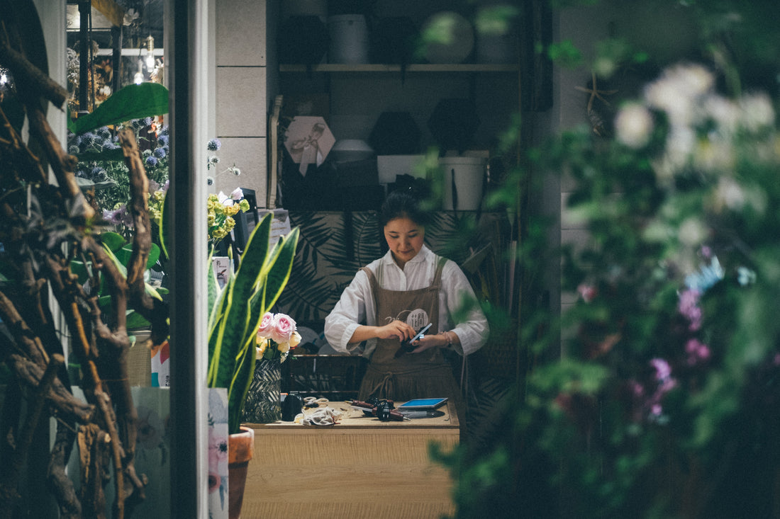 Florist working in flower shop