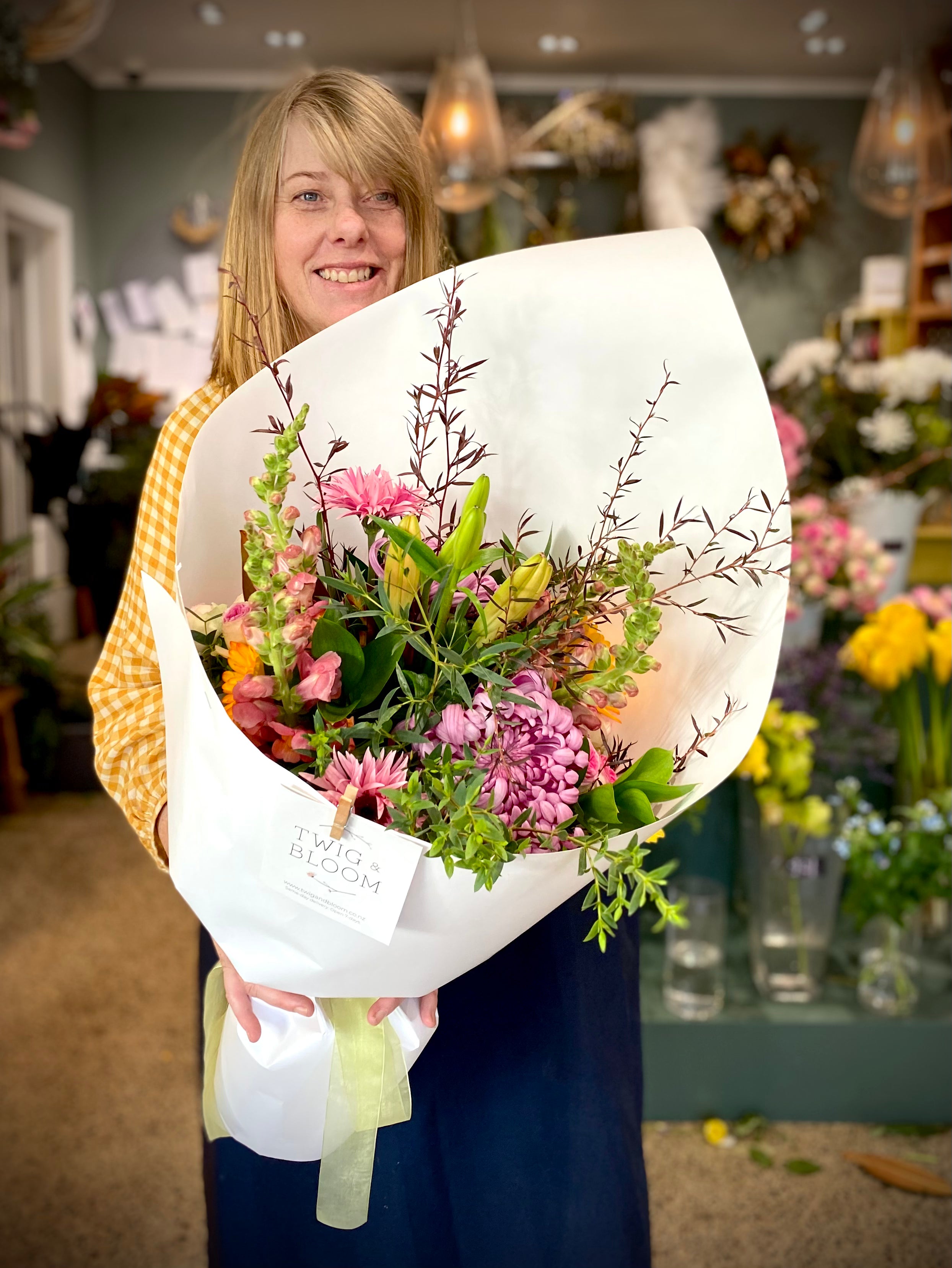 Tara holding a bouquet of fresh flowers